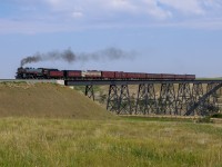 The Empress is back! CP 2816 makes a test run down the Aldersyde Sub, crossing the Little Bow River at Carmangay, Alberta.