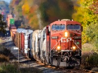 CP 8811 rolls eastbound on the Belleville Sub during the brief but colourful autumn.