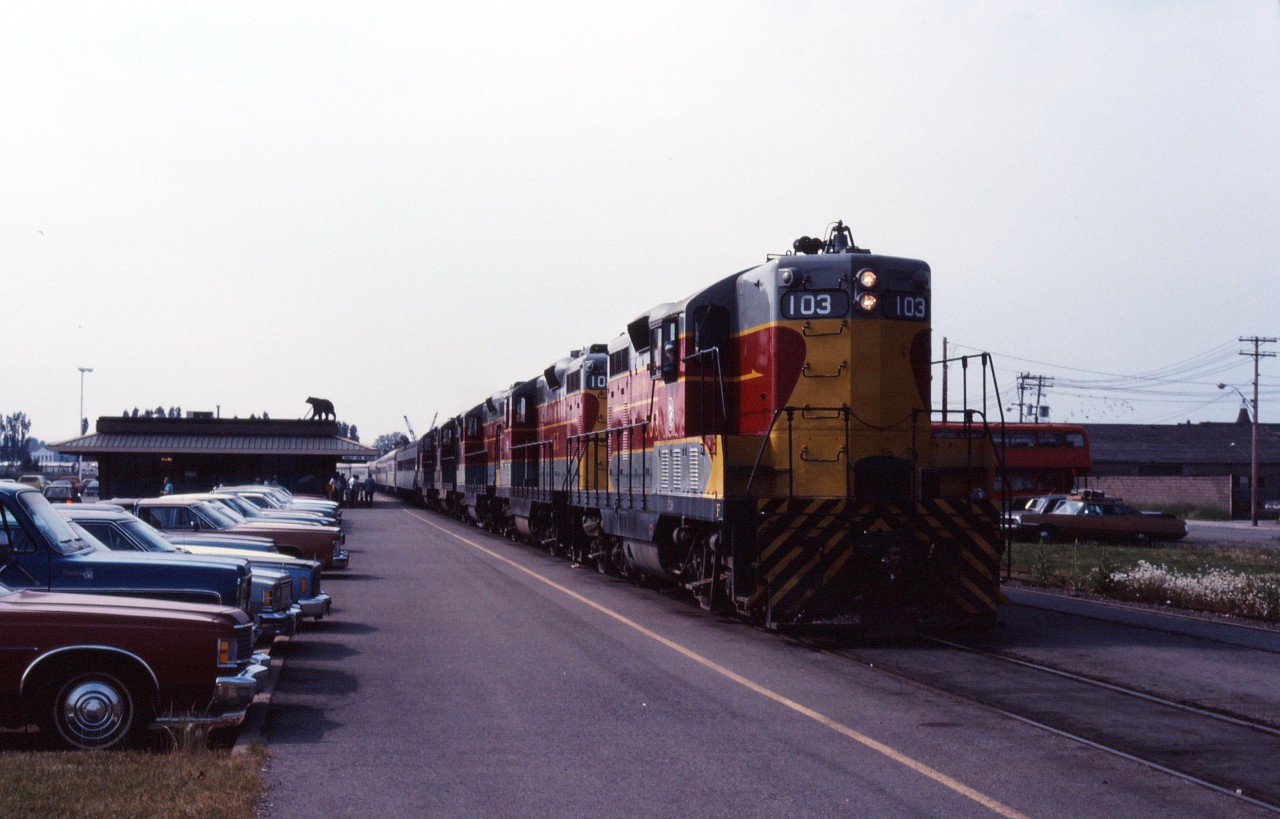 Algoma Central 103, one of 5 GP7s remanufactured a year earlier at GMD in London, leads the Agawa Canyon Tour Train at the downtown station in the "Soo".