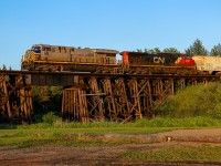 Edmonton to Whitecourt L 51551 28 crosses the first of many large, wooden trestles on the Sangudo Subdivision, as they depart St. Albert.