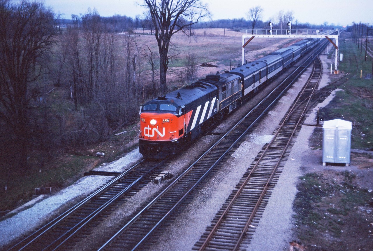 CPA-16-5 6702 is looking good as she leads an unidentified FPA4 on a westbound passenger train through Aldershot in the spring of 1965. From what I can find, the 6702 was retired in March 1969.
