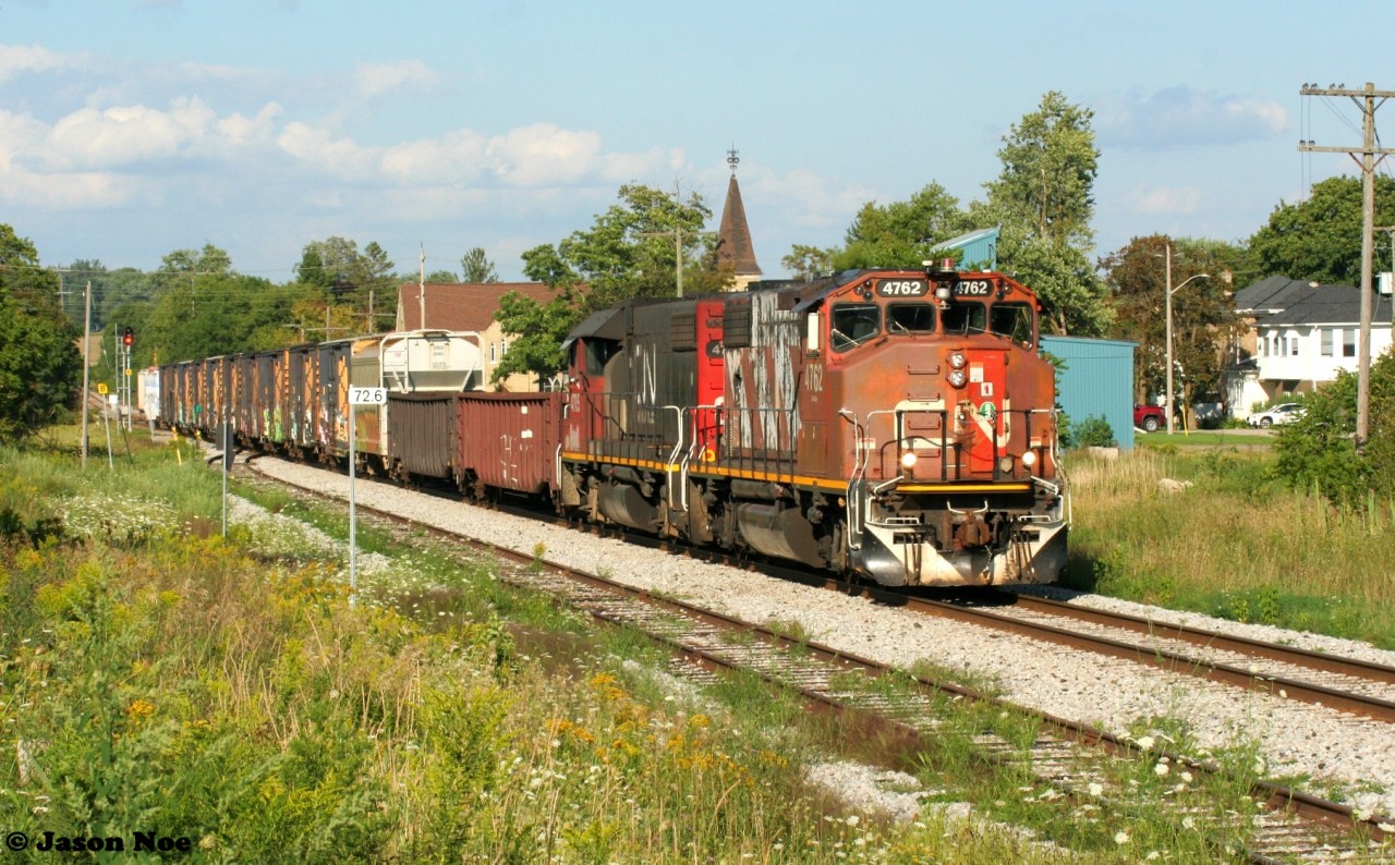 A later than normal departure from Kitchener, Ontario had CN L568 heading west to Stratford through Baden in the early evening as seen here with 4762 and 4705.