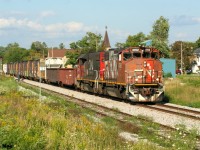 A later than normal departure from Kitchener, Ontario had CN L568 heading west to Stratford through Baden in the early evening as seen here with 4762 and 4705. 