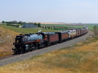 CP 2816 highballs through Nobleford, Alberta on CPKC's Aldersyde Sub.  The 2816 was performing break in runs between Calgary and Lethbridge, after being stored for over a decade.
