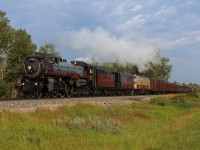 CP 2816 is back on flat ground after navigating the Dewinton Hill and accelerates into Okotoks, Alberta on a break in run to Lethbridge.