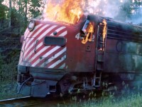 On July 5, 1975 Canadian Pacific FP7 locomotive No. 4062, the third locomotive of westbound Extra 4088 caught fire and was disconnected from the train near mileage 78.5, about two miles east of Franz, Ontario. A Ministry of Natural Resources forest fire suppression crew (including the photographer) was dispatched from Wawa to the scene to prevent the fire from spreading to the adjacent forest.