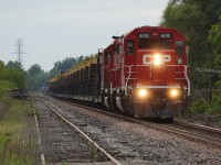After meeting CPKC 421 at Baxter, CPKC CWR-07 heads down the Mactier before backing into Lambton to drop off cars on its tail end.