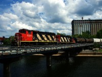 CN 500 is entering the Port of Montreal with a pair of zebras for power (CN 9543 & CN 4140).