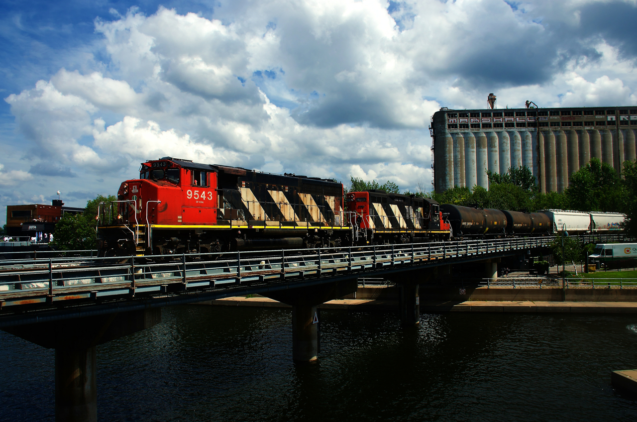 CN 500 is entering the Port of Montreal with a pair of zebras for power (CN 9543 & CN 4140).
