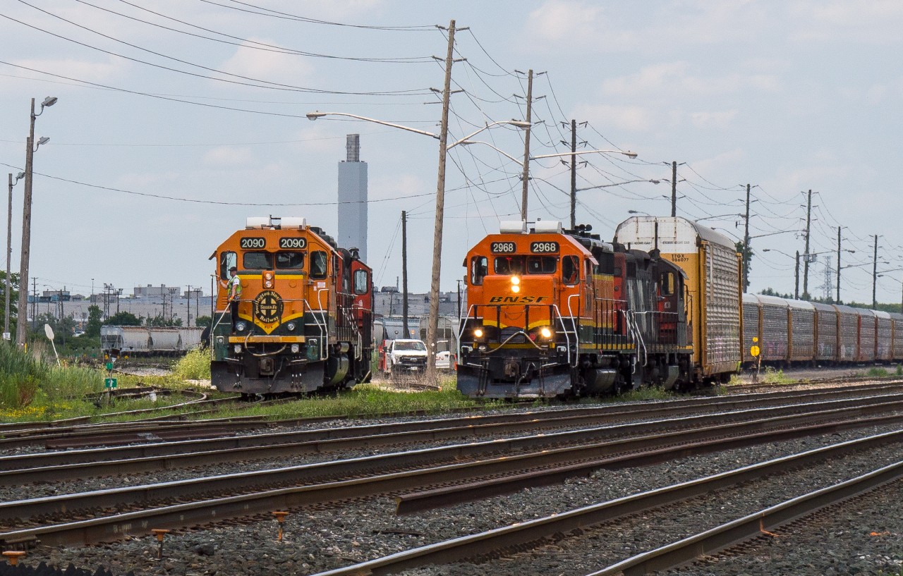 For a short period of time BNSF 2090 and BNSF 2968 were both assigned to Oakville Yard.  Pictured is 2090 making a move while 2968 prepares to depart for Aldershot.