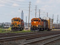 For a short period of time BNSF 2090 and BNSF 2968 were both assigned to Oakville Yard.  Pictured is 2090 making a move while 2968 prepares to depart for Aldershot.