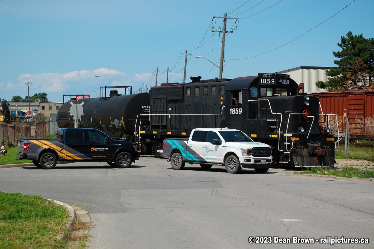 TRRY 1859 is on the ground with two tanks as the rails spread. They finally got them re-railed and cleared for the GIO Track crew to work on the track.