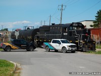 TRRY 1859 is on the ground with two tanks as the rails spread. They finally got them re-railed and cleared for the GIO Track crew to work on the track.