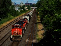 CN 527 is approaching Taschereau Yard with CN 9543 leading three more units.