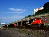 CN 322 is passing Turcot Ouest with a pair of SD70M-2s as it sets off cars for CN 400.