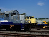 Noses of locomotives built by three different Canadian builders are seen at Exporail: GP9 AMT 133 built by GMD, SLQ 3569 built by MLW and LRC-3 VIA 6921 built by Bombardier.