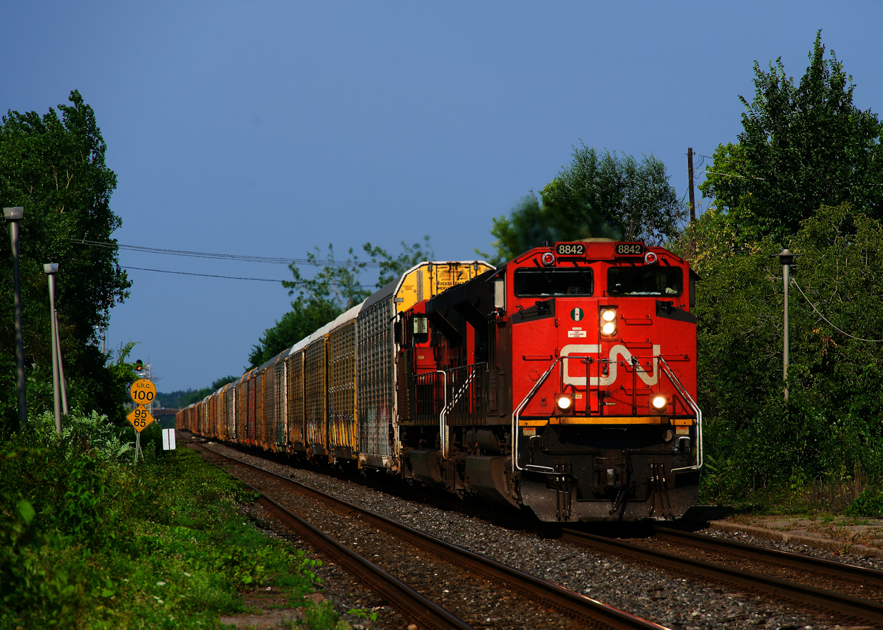 CN X276 has a 276-axle long train as it approaches Dorval Station with a pair of SD70M-2s (CN 8842 & CN 8917) for power and a consist of autoracks.