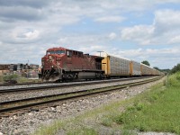 CP 8516 is working hard up the grade through Guelph Jct. with a solid train of tri's.