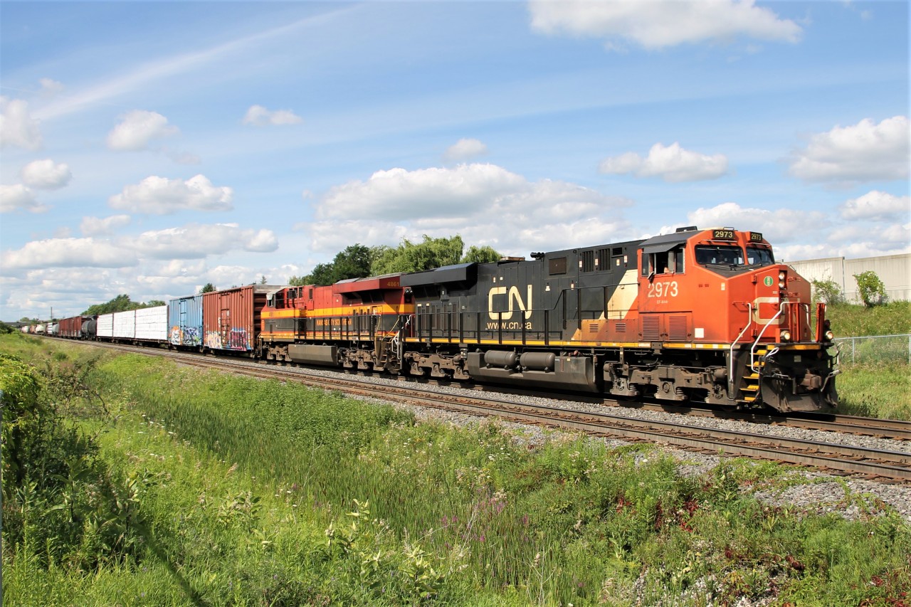 With KCS 4861 trailing, M397 heads down the south track of the Halton Sub., CN 2973 is in the lead today.