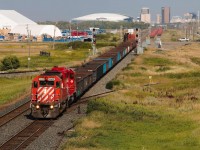 The Mon-Fri CPKC Regina turn borrowed work train-assigned CP 6069 and CP 5798 from Moose Jaw this week, whilst the regularly assigned 4-axles were busy doing orders for the Bulyea Sub. Looser restrictions on local power allow them to run through the steep Qu'Appelle Valley grades while work train power has to be treated with a higher standard of care if they are to do any revenue runs. Thus, this SD40 pair had a couple of days to themselves as substitutes to pick up the power shortage slack. I had coincidentally taken the day off from my summer job oblivious and hoping for GP38 action, so it was with much gratitude that I saw this oddball power on temporary revenue service.