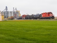 OSR 1591 is assigned to the St. Thomas job solo as they round the bend at Putnam. OSR 1591 is slowing down to work the industries there before continuing west to St. Thomas. 