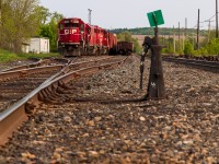 Rare mileage... sort of. Earlier in the day, CP H88 eastbound left a cut of manifest on the OSR connecting track at Woodstock anticipating a pickup by the shortline later in the day. By the time they returned westbound, OSR had not showed and a foreman needed the track clear to move MOW equipment out of Woodstock. CP H88 hooked back onto the cut they left behind and shoved it into the OSR yard so that a track was clear for the foreman. It's pretty uncommon to see CP on those tracks so it was worth a few shots despite the smoky skies blocking out the sun. 