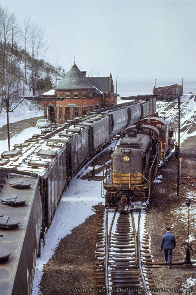 A late winter snow gingerly falls upon the CPR Goderich wayfreight, paused beneath the tell tails while the power is prepared for departure.  MLW RS3 8456 would be retired in 1983 and scrapped, while SW1200RS 8154, rebuilt to CP 1241 in 1982, would be sold to Independent Locomotive Services of Minnesota in 2012 as ILSX 932.Scan and editing by Jacob Patterson.