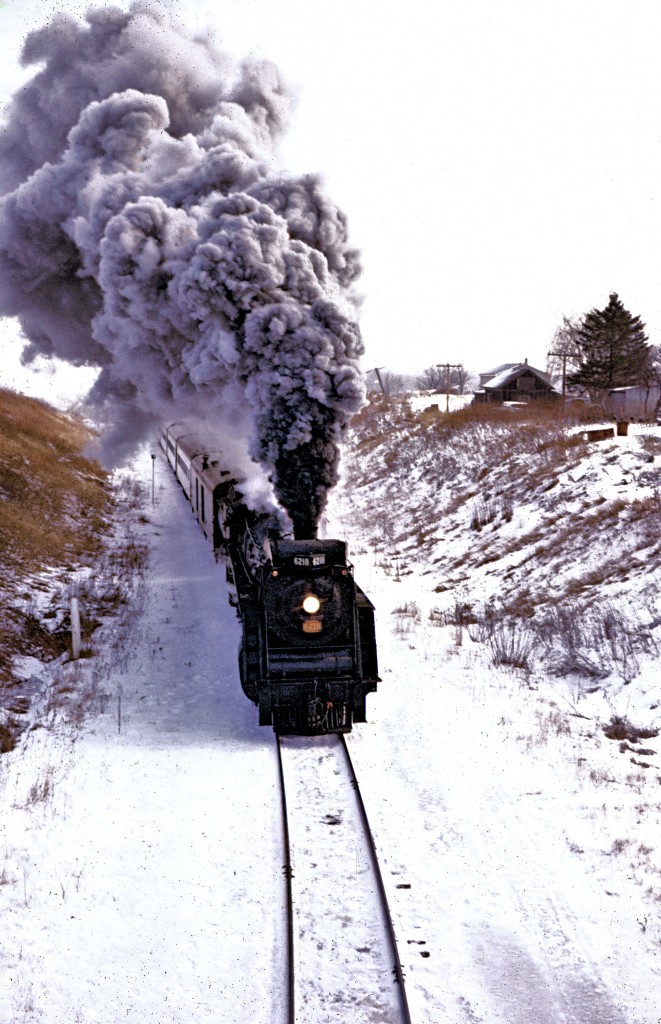 CN 6218 is about to pass beneath the Harrisburg Road bridge during a "runpast" on an Upper Canada Railway Society rail steam excursion on January 26, 1969.