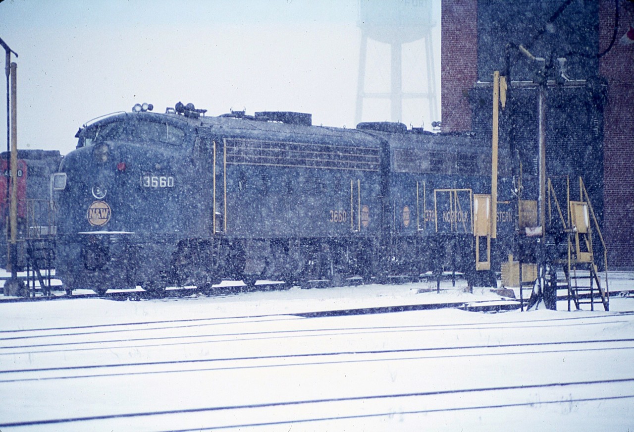 It might have been a cold snowy day, but still good enough to go out and see what is happening on the railroads. Upon arriving at Fort Erie it was nice to see a pair of those old venerable N&W locomotives parked out front of the CN diesel shop. Grabbed a shot of them from the roadway, playing it safe in slippery conditions by not crossing the tracks. These F7A units, N&W 3660 and 3725 were both from the former Wabash stable at one time, and were a familiar sight around Fort Erie back in those days. Both were built circa 1950. Activity at the diesel shop ceased back around 1989 as CN closed down the shop and pulled up most of the track. Currently this old repair facility is home to a fledgling railroad museum.