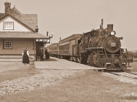 Alberta Prairie Railway's afternoon excursion from Stettler arrives at Big Valley behind # 41.The photo was made on July 7th but has been rendered in sepia to demonstrate what it might have looked like 80 years ago.