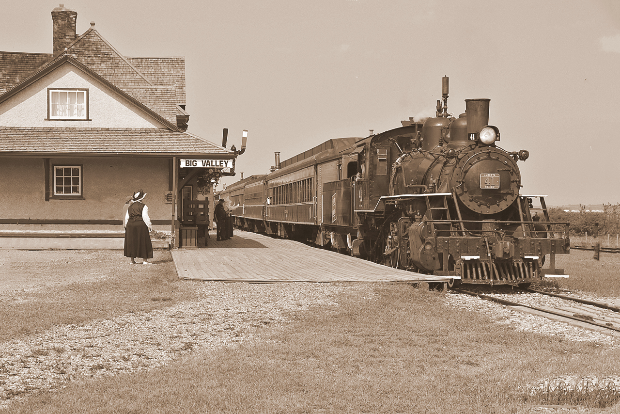 Alberta Prairie Railway's afternoon excursion from Stettler arrives at Big Valley behind # 41.The photo was made on July 7th but has been rendered in sepia to demonstrate what it might have looked like 80 years ago.