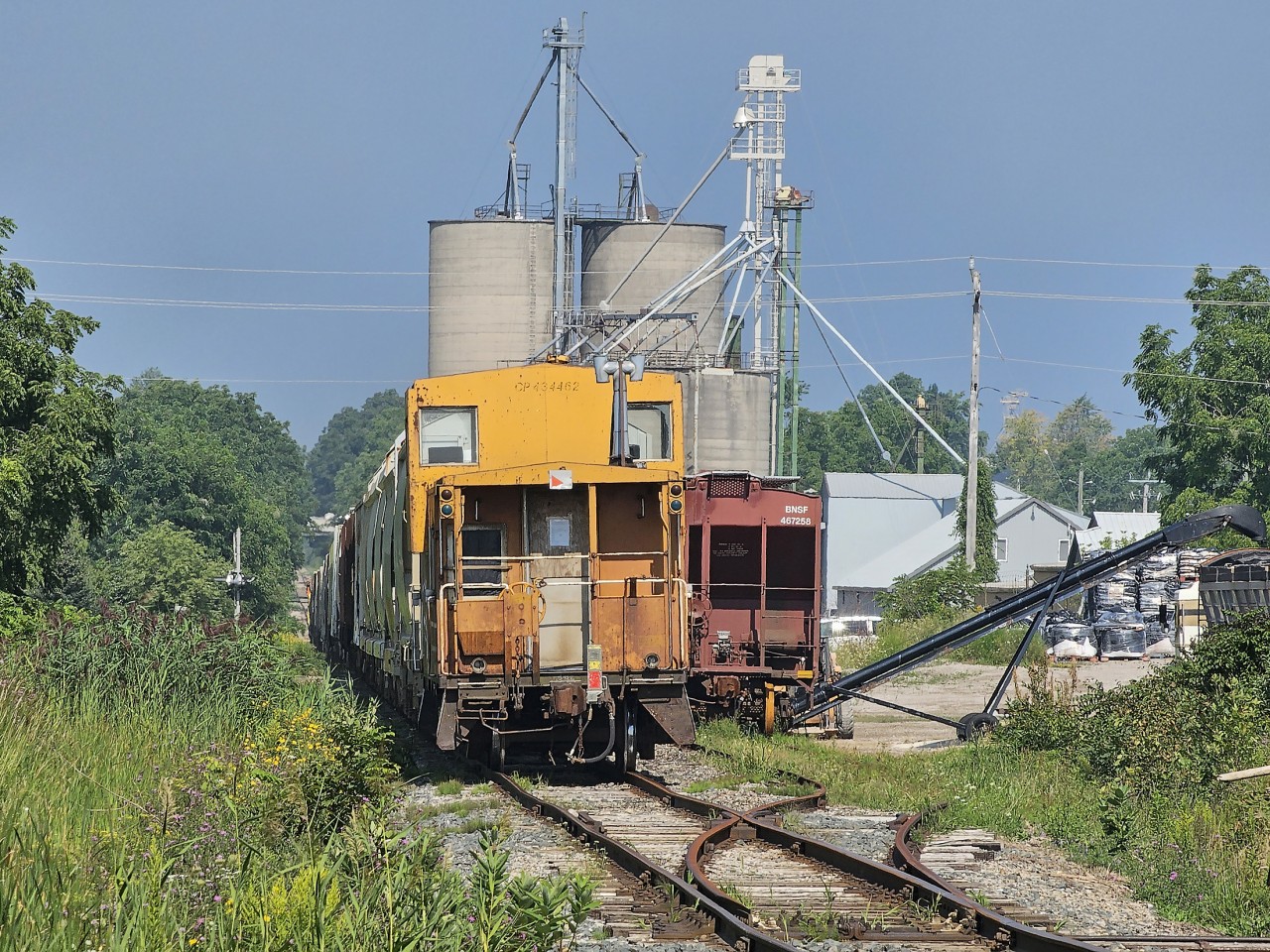 As I was leaving my home I heard GXR coming into town, so naturally I popped down the road to the tracks right as they were approaching my road. On the end of the train was a pleasant sight, former OSR's CP Widevision 434462. Sold to the Goderich Station restaurant, I've heard it will be converted to sell Ice Cream. Unfortunately, I had obligations to meet and couldn't stay to chase it. Glad I got to see it on what's likely its last trip on rails.