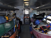 VIA 6205's interior on this date holds 8 canoes and supplies instead of passengers.  
