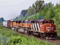 A well know location by many railfans in the GTA. The early 2000’s still found GP40’s in the lead of many mainline trains, and if you heard one in the lead it often meant something decent trailing, not to mention train 395 was a reliable train for foreign power. Here a pair of BNSF Dash-9’s, one H1 and a H2 round the corner at mile 30. 