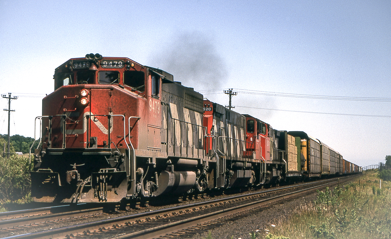 CN 9479 is west of Port Hope, Ontario on August 6, 1987.