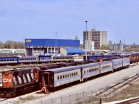 By the spring of 1998 basically all class one MLW’s, and Bombardier products were retired and pending disposition. VIA’s main Toronto yard and CN’s small yard in Mimico soon became a storage yard for these units as well as a number of pieces of VIA equipment no longer needed. This angle show a good variety of units and equipment no longer on both CN and VIA rosters. Numerous M420’s, HR412’s and HR616’s can be seen behind some “Tempo” coaches, while RDC’s and steam generators as well as old blue steam heated cars can be seen in the background. The west end of the yard not seen here held a lot of similar cars and  units as well. 