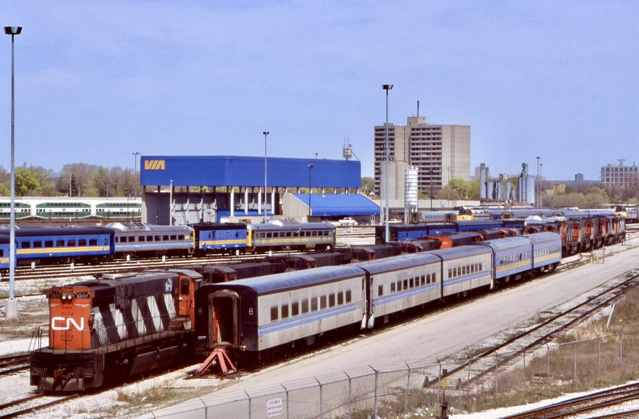 By the spring of 1998 basically all class one MLW’s, and Bombardier products were retired and pending disposition. VIA’s main Toronto yard and CN’s small yard in Mimico soon became a storage yard for these units as well as a number of pieces of VIA equipment no longer needed. This angle show a good variety of units and equipment no longer on both CN and VIA rosters. Numerous M420’s, HR412’s and HR616’s can be seen behind some “Tempo” coaches, while RDC’s and steam generators as well as old blue steam heated cars can be seen in the background. The west end of the yard not seen here held a lot of similar cars and  units as well.