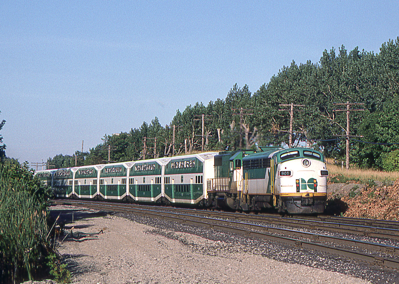 It is August 12, 1985 in Scarborough, Ontario where GO 901 is at the east end of a westbound train heading for Toronto.