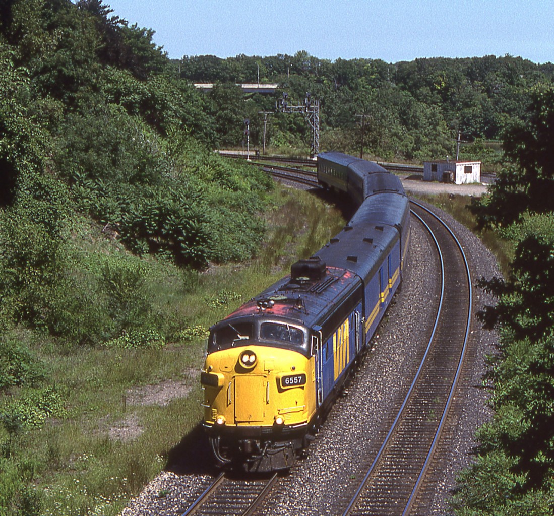 VIA 6557 is westbound after leaving Bayview Junction, Ontario on August 11, 1987.
