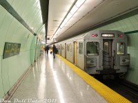 Back when the first of the new Bombardier Toronto Rocket subway cars were starting to be delivered and undergo testing, the writing was on the wall for most of the TTC's old 1970/80's-era H4, H5 and H6 subway car fleets. While some elected to wait until the final few trains and final runs, others took the "bird in the hand approach" and got their photos while the going was good (the final Hawker Siddeley H5 cars retired in June 2013).
<br><br>
Here, TTC H5 5802 trails a southbound University line train (notes indicate 5701 leading) as it paused at St. Patrick subway station (Dundas Street) before heading south. St. Patrick and nearby Queen's Park were two unique stations on the University Line where the platform areas were just built in the TBM-bored tunnels, as opposed to using the cut-and-cover construction style for the entire station area like other stops along the early 1960's line. Some parts of the station had wall panels removed for maintenance, revealing metal tunnel lining sections underneath that were stamped for Canada Iron Foundry (Canron), with various October 1960 casting dates.