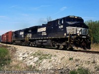 Captured: NS 328 with NS C40-9W 9066 and NS C40-9W 9371 at Mile 15.17 (Yager East) on the CN Stamford Sub at 13:00 on May 23/2002.