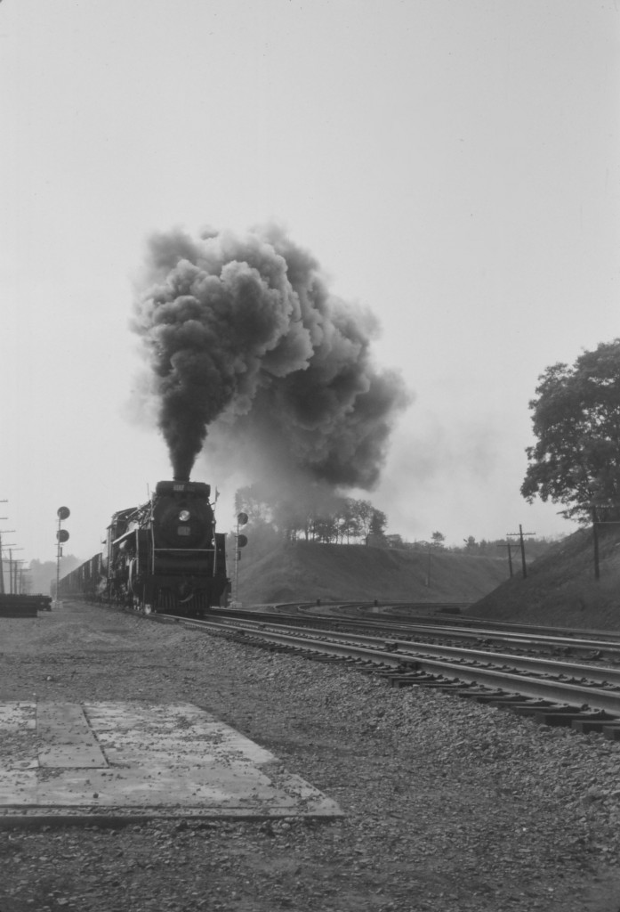 This image was taken in 1961, not the steam era! I'm guessing at the date; however, it's an educated guess since there was an NMRA Convention excursion from Hamilton to Burlington return with the 6167 on Saturday October 21, 1961. Here the 6167 storms through Bayview with freight on its way back to Toronto. (Image converted to black & white due to extreme colour shift.)

For a shot of the Northern at the CN Hamilton roundhouse, see this image:

http://www.railpictures.ca/?attachment_id=46084