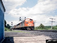 CN 9165 with an A-B-A consist and a Geep head through Bayview Junction with a freight in summer 1986. 