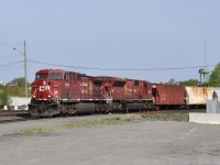 A CP eastbound freight eases through Sudbury, Ontario behind the 9754 and 9106.  The 9106 was subsequently rebuilt to the 7053.