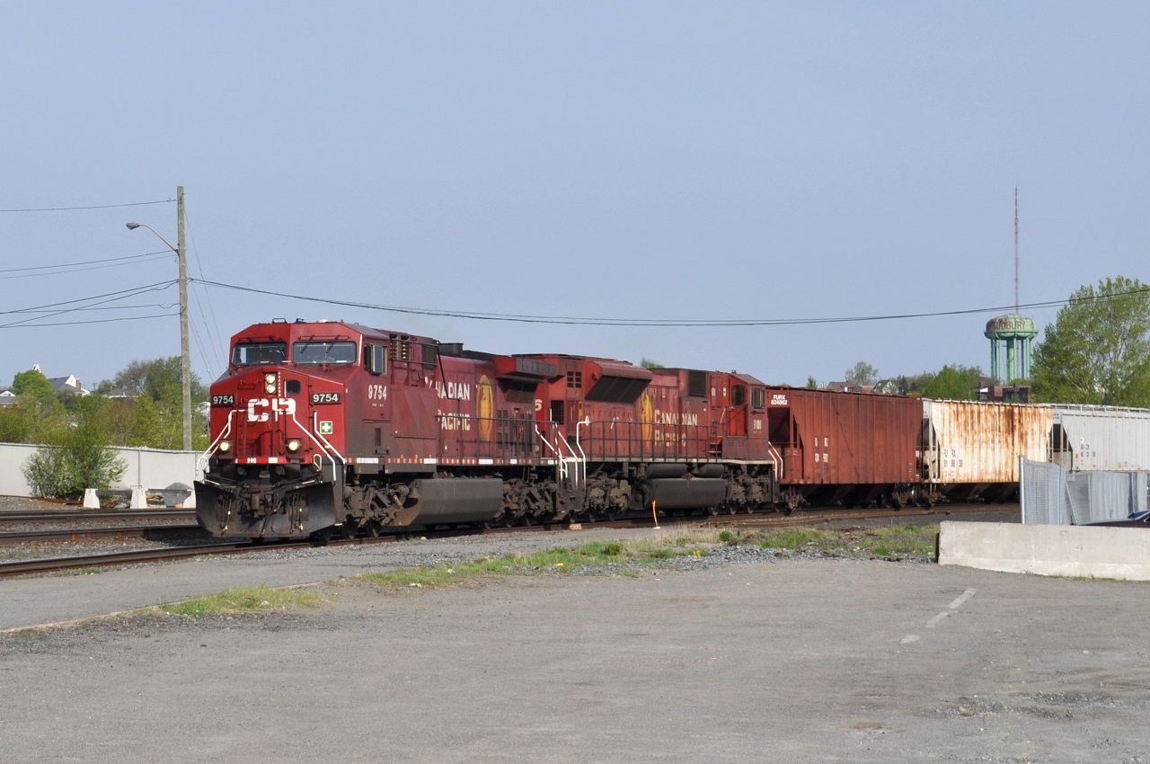 A CP eastbound freight eases through Sudbury, Ontario behind the 9754 and 9106.  The 9106 was subsequently rebuilt to the 7053.