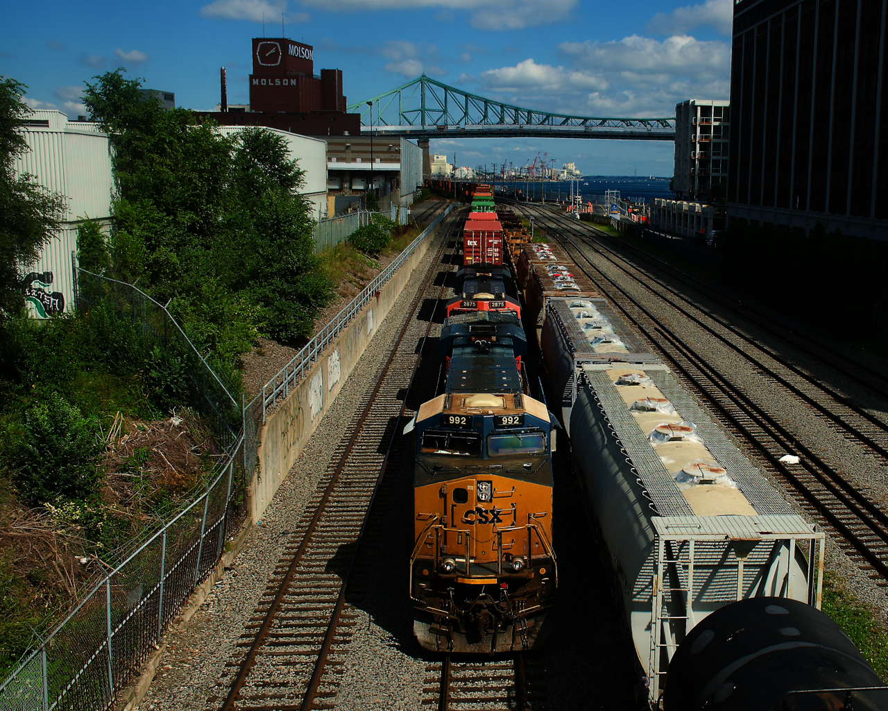 CPKC 132 has a CSXT/CN pair for power as it prepares to drop its train in the Port of Montreal.