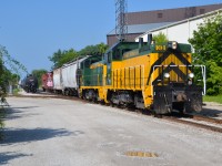 The Essex Terminal 1600 job switches Windsor's north end with both of the ETR's sharp looking heritage units for power. The 104 is the more recent of the two, wearing paint designed as a cross between ETR's original green and later black chevron liveries.