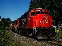 CN 9584 looks sharp as it leads a short transfer out of the Port of Montreal just a few minutes ahead of CN 100's light power.