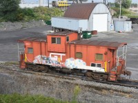 GT 79047 sits at CN Pointe St. Charles, QC waiting for its next assignment as a rider car.