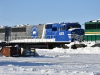 HBRY 6005 SD60M (ex-UP) sits sandwiched between HBRY 6004 & HBRY 5005 at HBR's The Pas, MB diesel shop yard on a sunny but bitterly cold March 16, 2023.